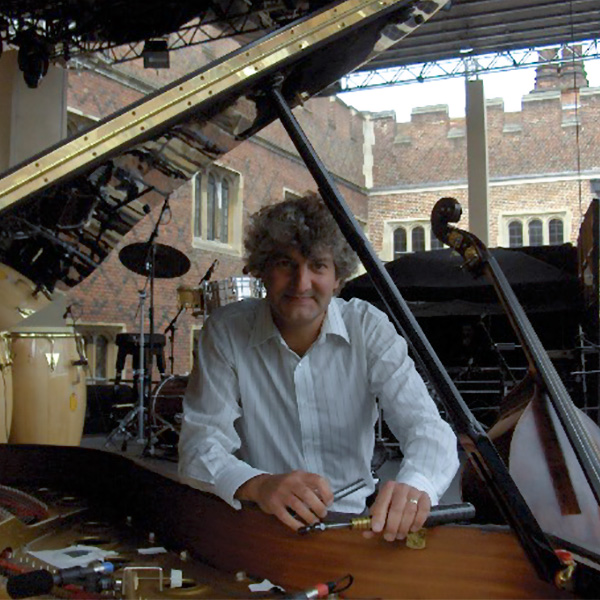 Tim Hendy tuning a grand piano for the Hampton Court Festival