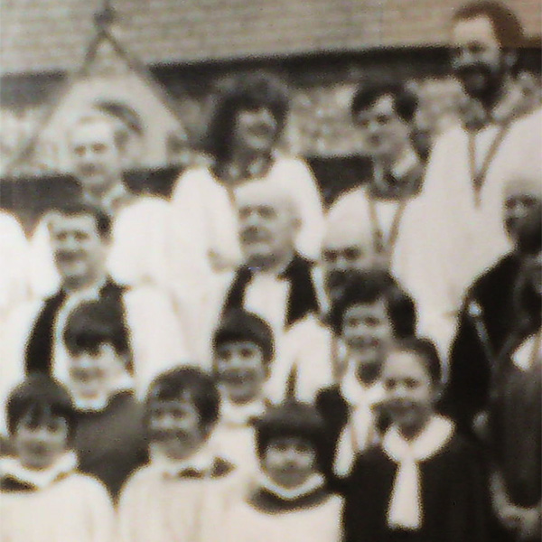 Black and white photo of Tim Hendy in a church choir